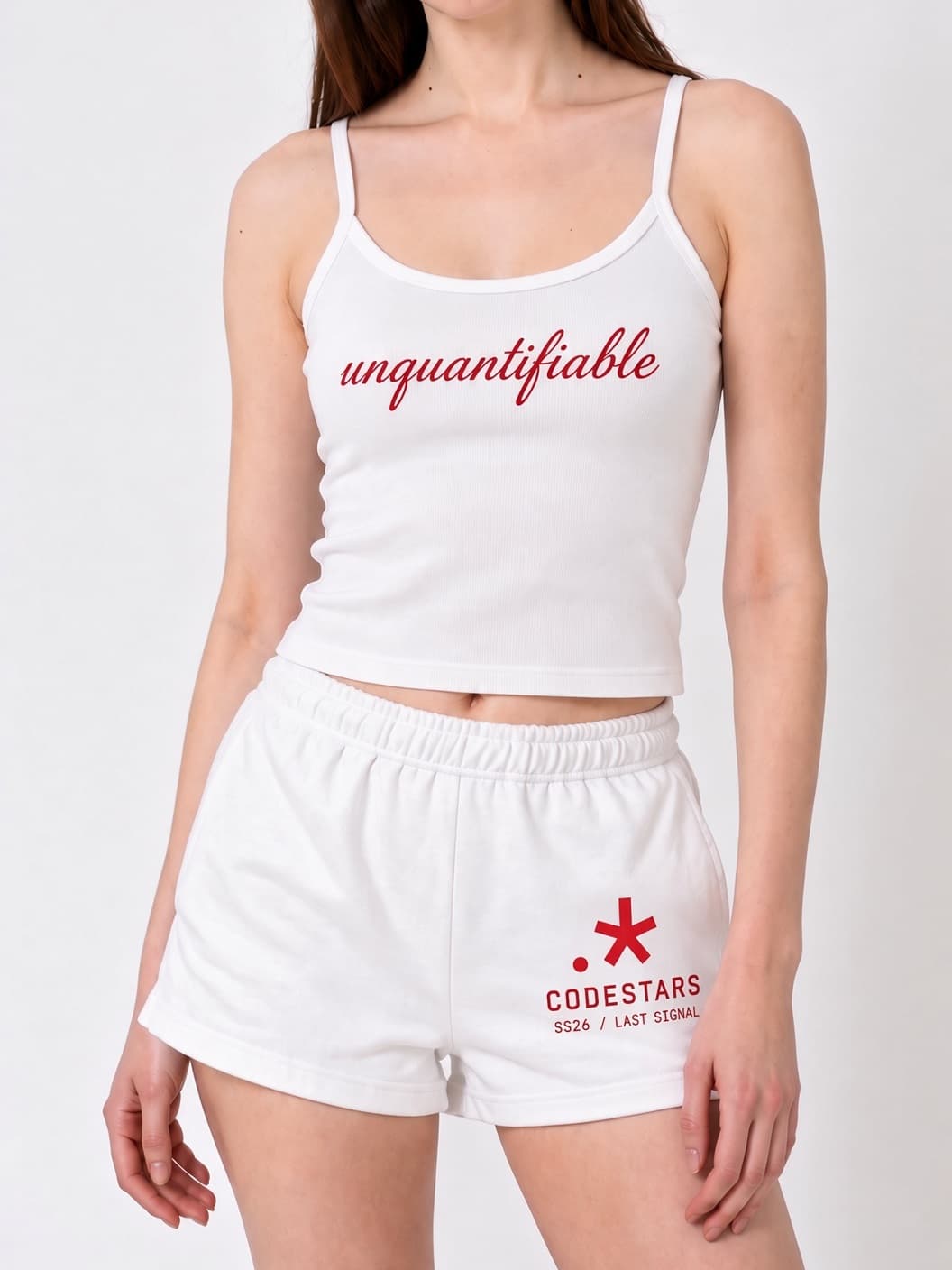 Campaign view of white Cookie Shorts with the red Codestars collection mark on the front-left leg.